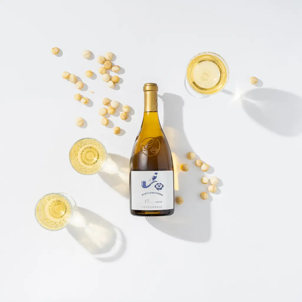 babylonstoren chardonnay glasses and nut white wine.webp